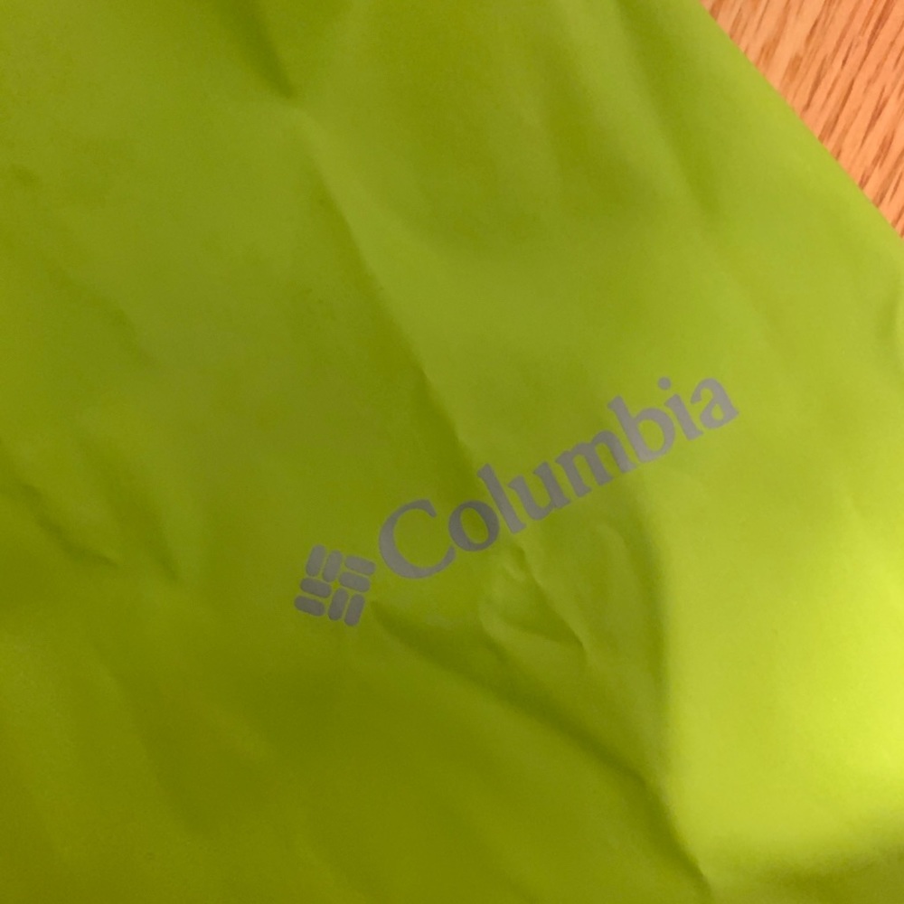 Neon green Colombia rain coat